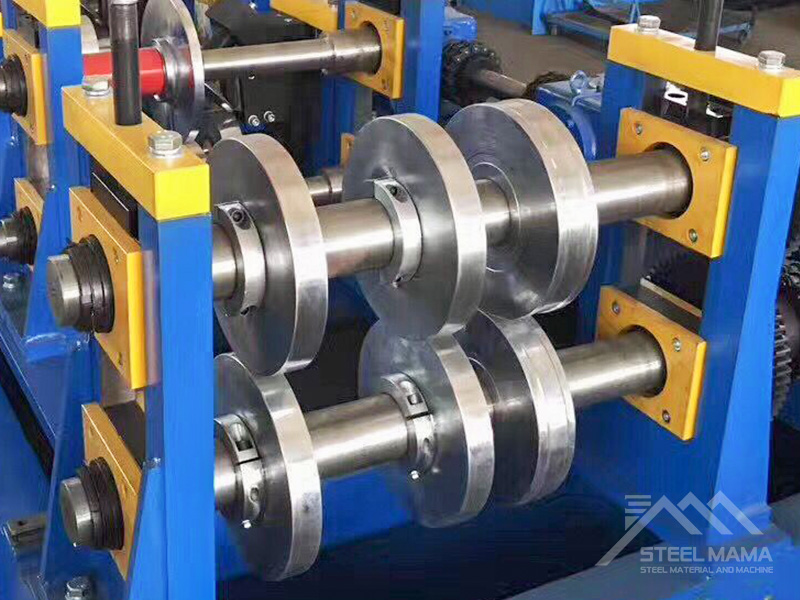 What are the main components of a roll forming machine?